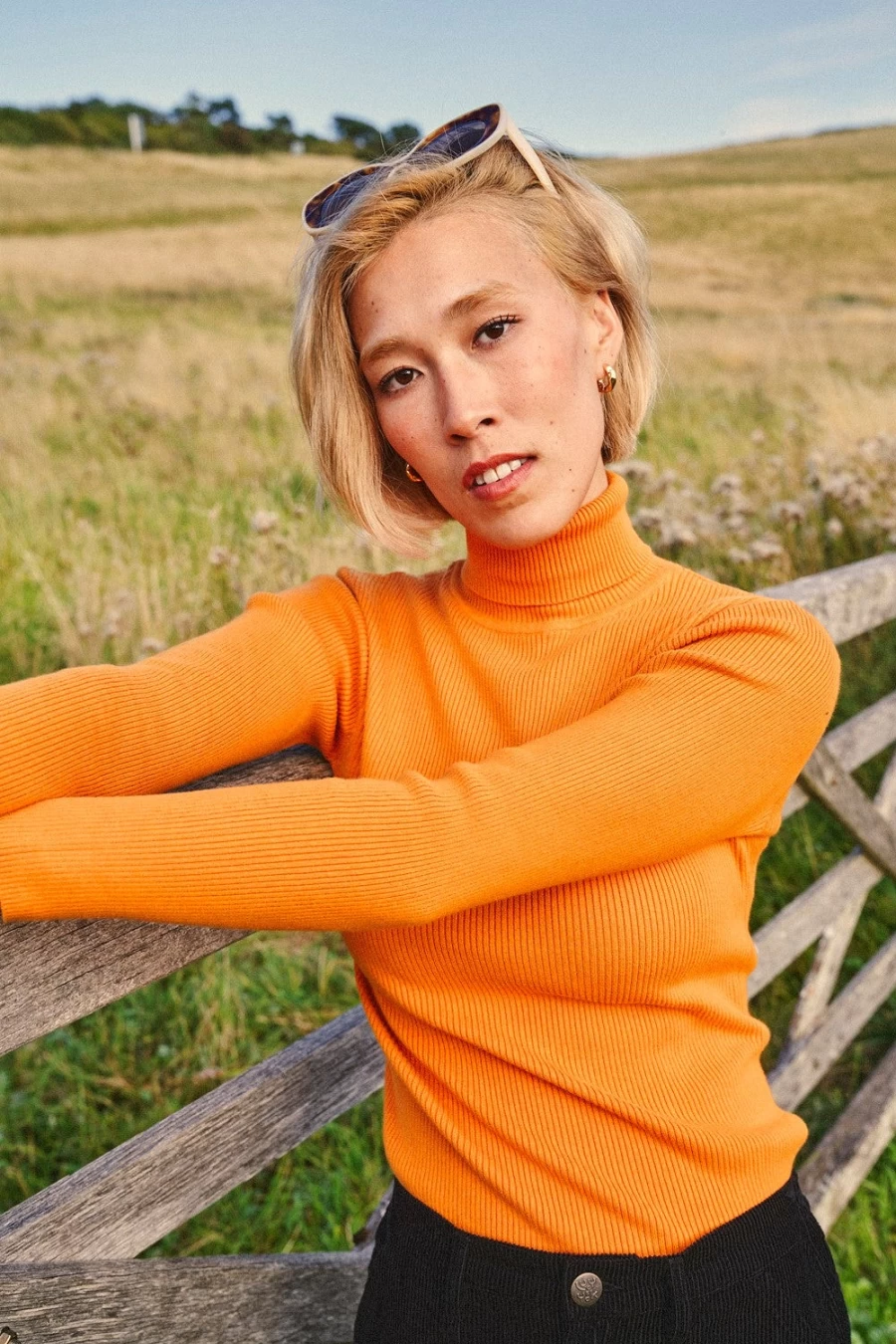 Lucy & Yak Women's Aiden Roll Neck Top - Organic Cotton Knit in Orange Pepper